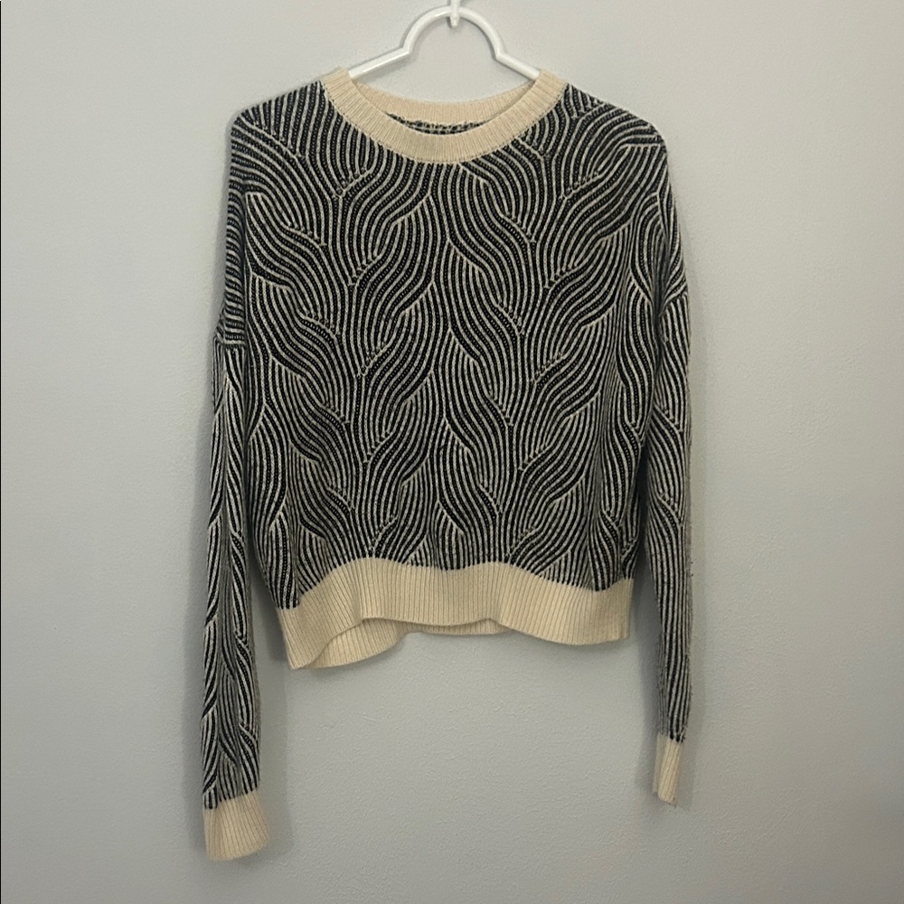 Elegant Black and Cream Striped Sweater